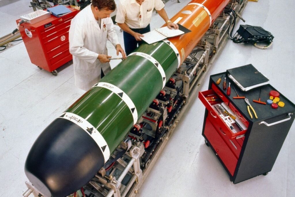 Technicians performing maintenance in 1982 on a Mark 48 ADCAP torpedo prototype in Keyport, Washington.
